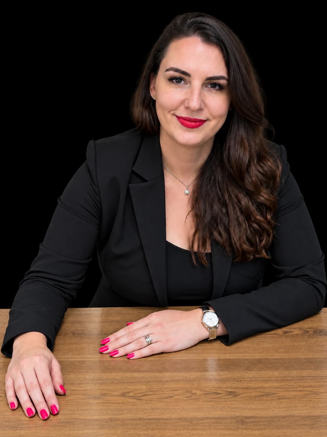 Jana Affum, international recruitment partner, seated at her desk